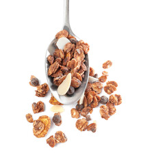 Spoon with granola on white background, top view. Healthy snack