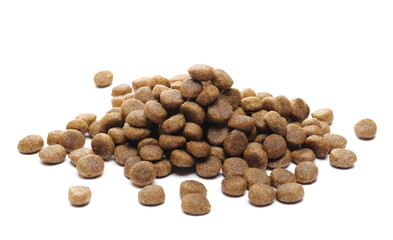 Dog food pile, dry granules for puppies and young dogs isolated on white background
