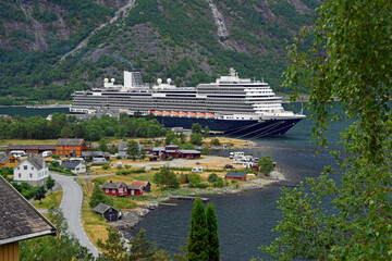Giant cruise ship dwarfs a village in Norway
