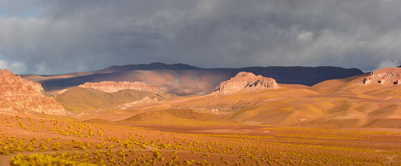 Landscape with volcanic rocks and hills on the puna in northwest Argentina