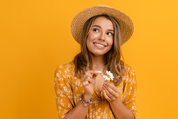 beautiful attractive stylish woman in yellow dress and straw hat
