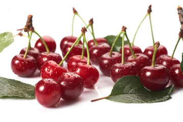 Image cherries on a white background. Cherries with drops isolated on white background