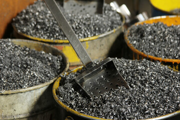metal shavings inside the metal bucket