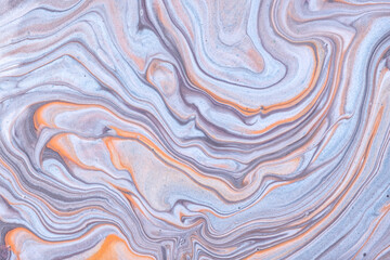 Abstract fluid art background light blue and gray colors. Liquid marble. Acrylic painting on canvas with orange gradient