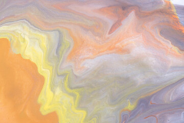 Abstract fluid art background light orange and gray colors. Liquid marble. Acrylic painting with yellow gradient.