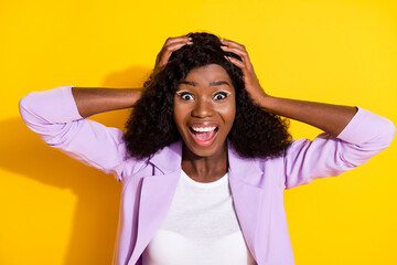 Photo of young happy crazy excited african woman hold hands head sale huge sale discount isolated on yellow color background