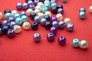 beads on a red background