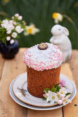 Easter cake in flowers. Side view.