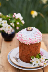 Easter cake in flowers. Side view.
