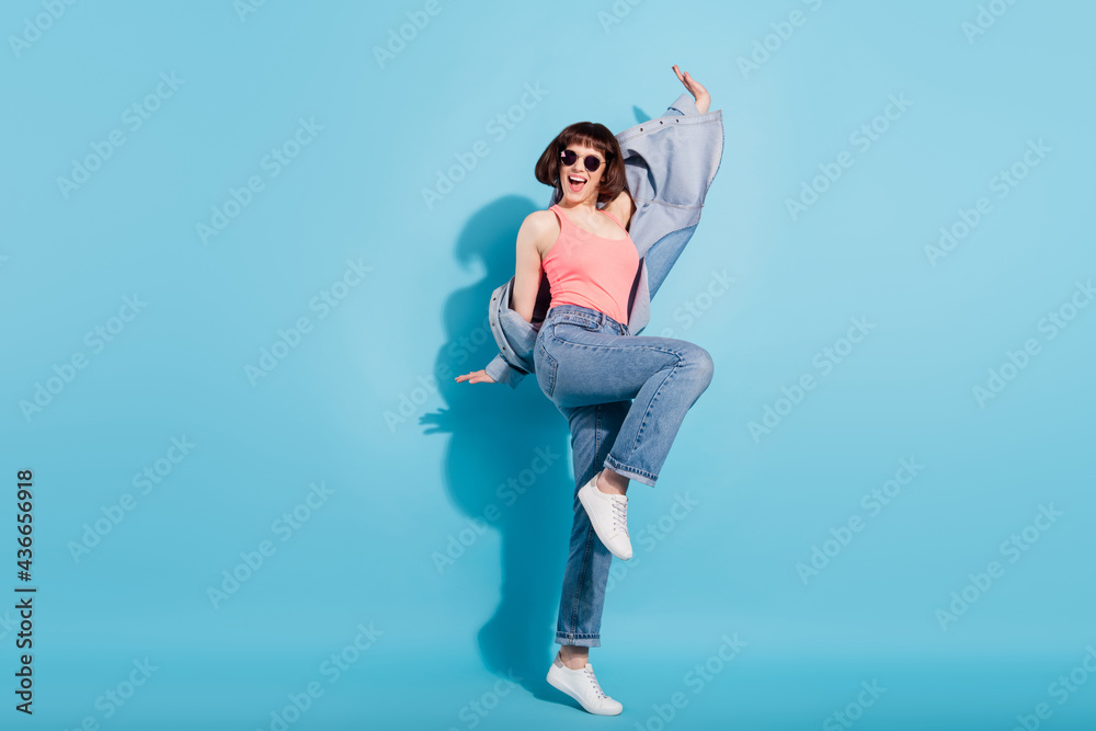 Canvas Prints Full body photo of funky young lady dance wear top jeans eyewear isolated on blue color background