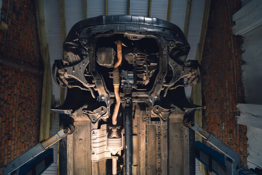 Ukraine, Vinnytsya - May 21, 2021: Hyundai tucson jm 2006, Vehicle underbody exhaust pipe, catalyst, resonator, exhaust system. engine