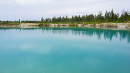 nature landscape summer spring blue clear lake forest in the distance
