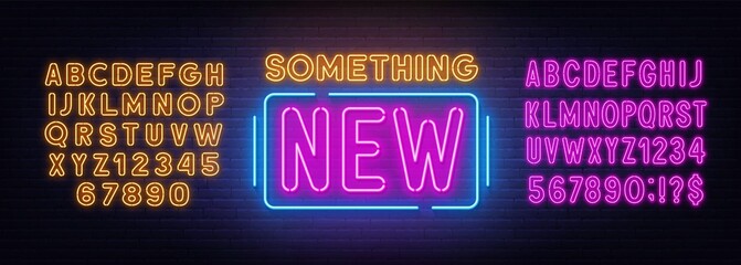 Something new neon sign on brick wall background.