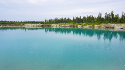 nature landscape summer spring blue clear lake forest in the distance