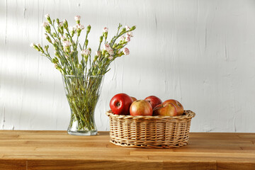 Fresh red apples fruits on desk and free space for your decoration 