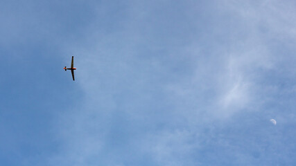 airplane in the blue sky with copy space