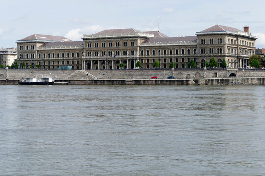 Classic building of the Corvinus University of Economics from the Danube river in Budapest Hungary