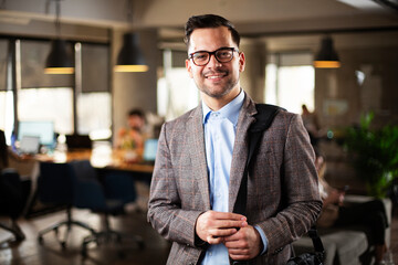 Portrait of handsome businessman. Young man working in the office.