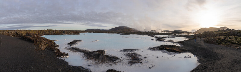 Views of moss covered lava fields and milky blue waters near the Blue Lagoon, Iceland