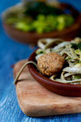 vegan meatballs, tagliatelle and kale
