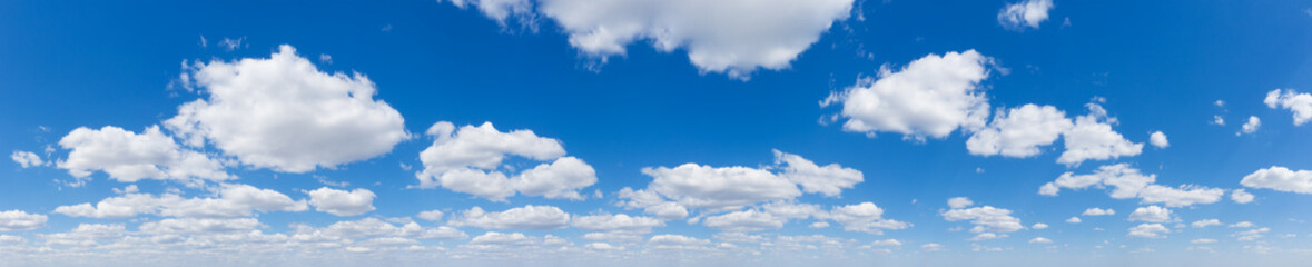 Obraz na płótnie Canvas Blue Sky background with tiny Clouds. Panorama background