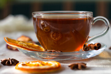 Cup of tea and slices of dried orange