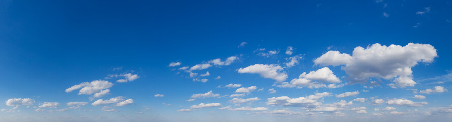 Blue Sky background with tiny Clouds. Panorama background