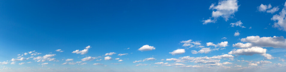Blue Sky background with tiny Clouds. Panorama background