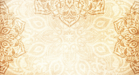 Soft earthy golden tan sandstone textured background with mandala decorations - copy space, frame