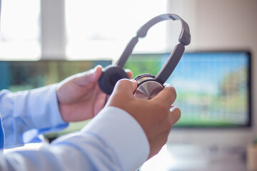 businessman with headphones at work