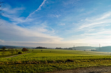 Fototapeta na wymiar German countryside, field and blue sky - landscape
