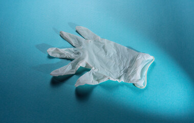 medical gloves on blue background