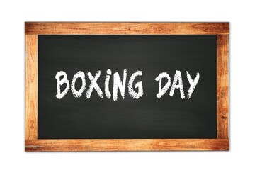 Obraz premium BOXING DAY text written on wooden frame school blackboard.
