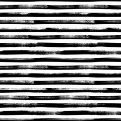 Grunge bold lines vector seamless pattern. Horizontal brush strokes, straight stripes or lines. Black ink striped hand drawn background. Geometric ornament for wrapping paper. Dry brushstrokes pattern