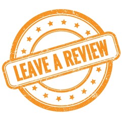 LEAVE A REVIEW text on orange grungy round rubber stamp.