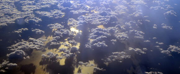 Fototapeta na wymiar Sun reflection in Mediterranean from airliner.