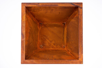 Empty angular rusty flower bowl in square shape