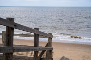 Wooden fence barrier on the North Norfolk coast