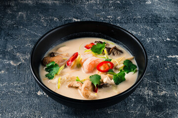 Traditional thai soup Tom Kha coconut milk with shrimp