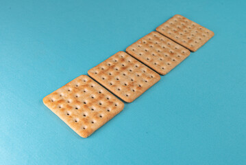 Salt crackers on the blue background