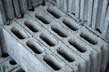 Brickblock or brickwork object, material of building construction. Industrial object, background and texture photo.