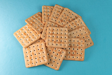 Salt crackers on the blue background