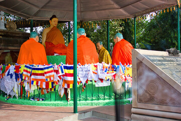 Statues of lord Buddha and his disciples at Dhamma chakka pavattana sutta wheel of law at Sarnath...
