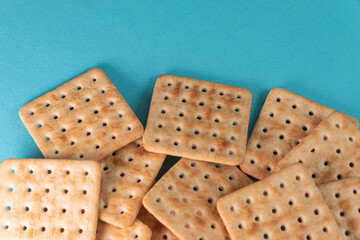 Salt crackers on the blue background