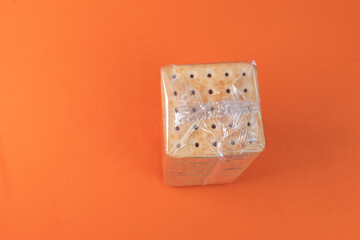 Salt crackers on the orange background