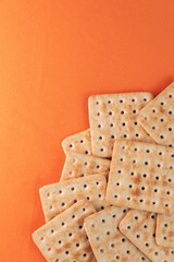 Salt crackers on the orange background