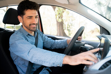 Man using gps navigation system in car.