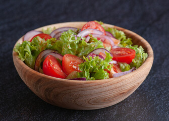 salads of various modifications in wooden utensils