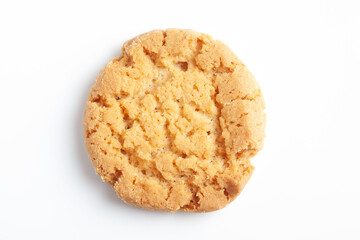Close-up of delicious freshly baked simple cookies or biscuits. Isolated over studio white background