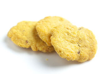 Close-up of freshly baked spicy and salted Mathri or matthi, traditionally authentic Rajisthani . Isolated over studio white background